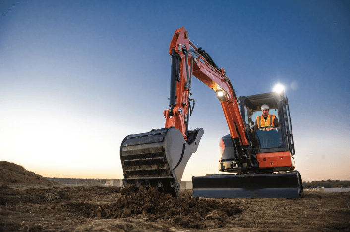 Excavator digging up dirt