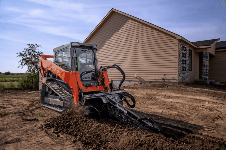Track loader working on a construction site